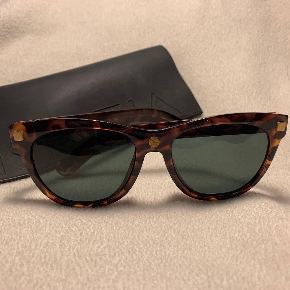 Vintage 80s Krizia brown tortoise shell sunglasses in gently used condition.